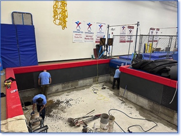 Real Dry begins work on the gymnastics pit at the South Shore YMCA.